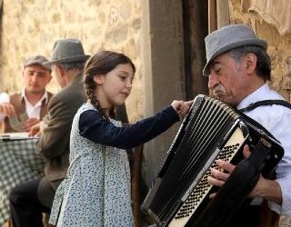 E come potevamo noi cantare…